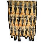 A Twenty Pelt Coyote Skin Car Rug, 2nd half 20th century, each pelt retaining its free flowing tail,
