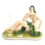 Karl Ens porcelain figure of nude young woman, designed by H Rutz, in a seated pose, blue printed