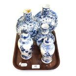 Pair of Chinese blue and white moonflasks (one a.f.), another smaller and two small vases and covers