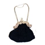 A Continental silver mounted black velvet evening bag