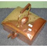 A 19th century copper tea kettle