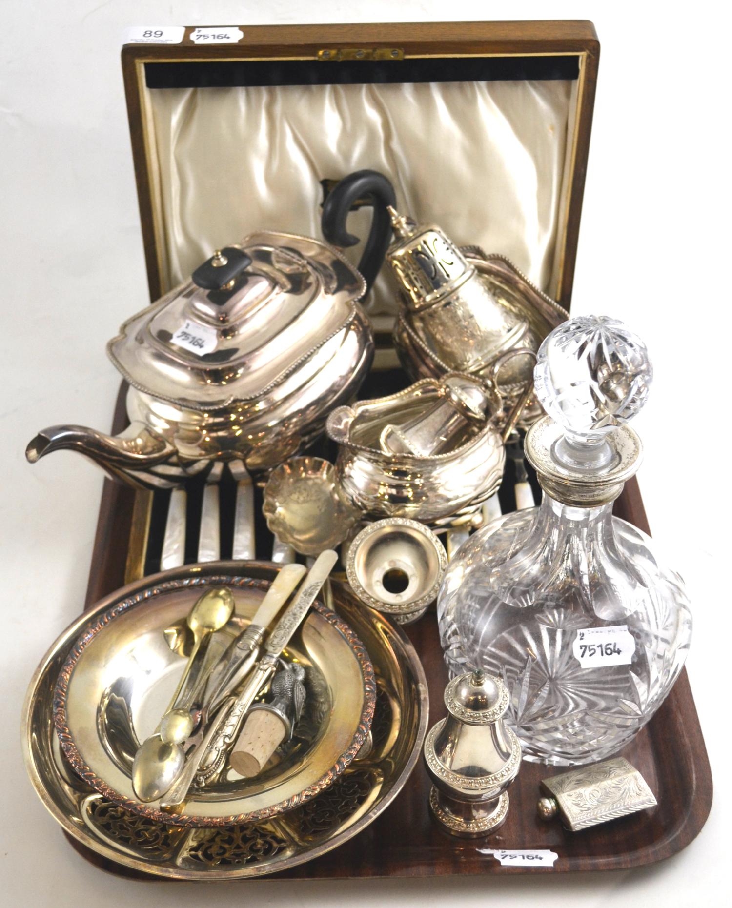 A quantity of silver and silver plate including a silver collared decanter, silver spoon, silver