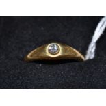 An 18ct gold ring set with a diamond approx. 0.1ct