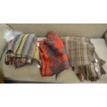 A red and green floral cloth, McNab tartan shawl together with a South American shawl (3)