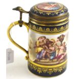 Vienna blue and gilt decorated tankard with hinged lid, 15cm high Rubbing to gilding on handle