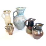 Five stoneware jugs by Michael Casson