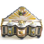 A French faience inkstand, late 18th/19th century, modelled as a sideboard, with fluted arched