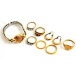 An 18ct gold mounted lady's wristwatch, two 22ct gold wedding bands, 9ct gold dress rings and a pair