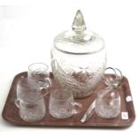 A cut glass punch bowl and cover, ladle and five glasses