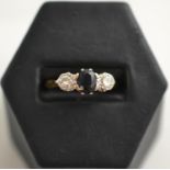 A sapphire and diamond ring, stamped '18CT'