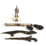 Silver mounted figure of a soldier, horn handled Eastern dagger with white metal sheath and two