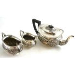 Embossed silver three piece tea service