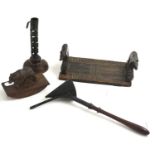 A ''rats tail'' candlestick, Black Forest book rack, blotter and a candle snuffer