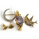 An amethyst brooch, a pair of 9ct gold earrings and two paste brooches