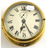 Smiths clock in a brass circular case (no key)