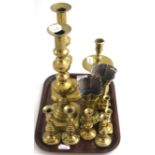 A group of 19th century brass candlesticks including a Heemskerk style candlestick