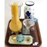 Glass cornucopia on marble base, blue Vaseline glass flowerhead on mirrored wall hanging, coloured