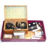 A small collection of Whitby jet in wooden box together with a small selection of costume jewellery