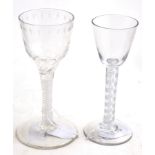 Two late 18th century glasses, one with double series opaque twist stem and engraved bowl, the other
