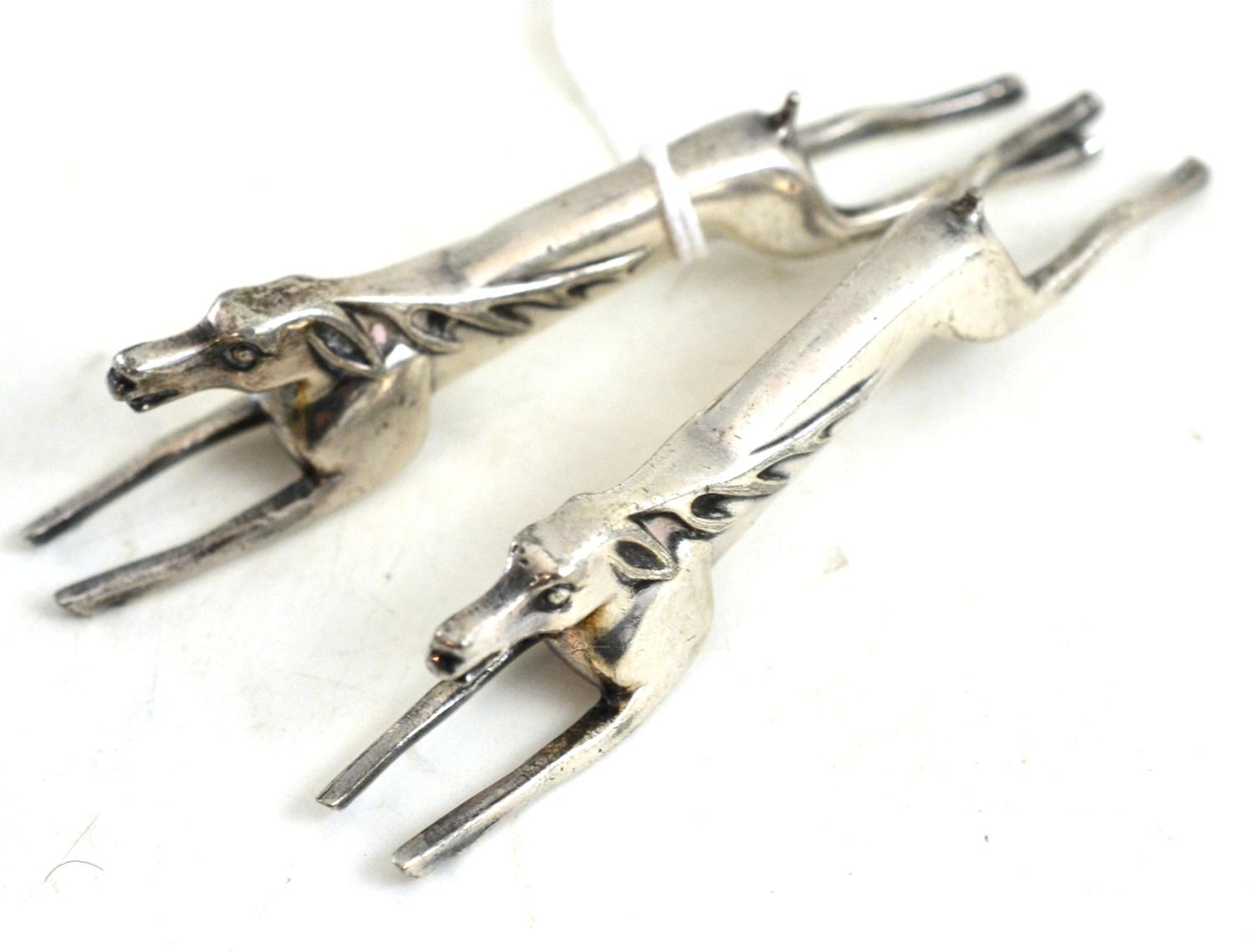 A pair of WMF silver knife rests in the form of running deer