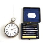 A pair cased pocket watch and an early 20th century set of six ivory carving implements with