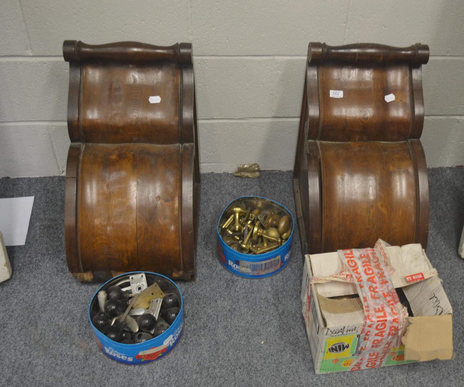 A pair of corner spandrels of oak and a box of door fittings