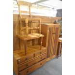 Pine cupboard, pine coffee table, pine chest of drawers and a rush seated chair (4)