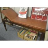 An early 20th century examination couch labelled 'Chas F Thackray Ltd Surgical Instrument Makers