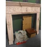 Pale pink painted fire surround decorated with acanthus leaves