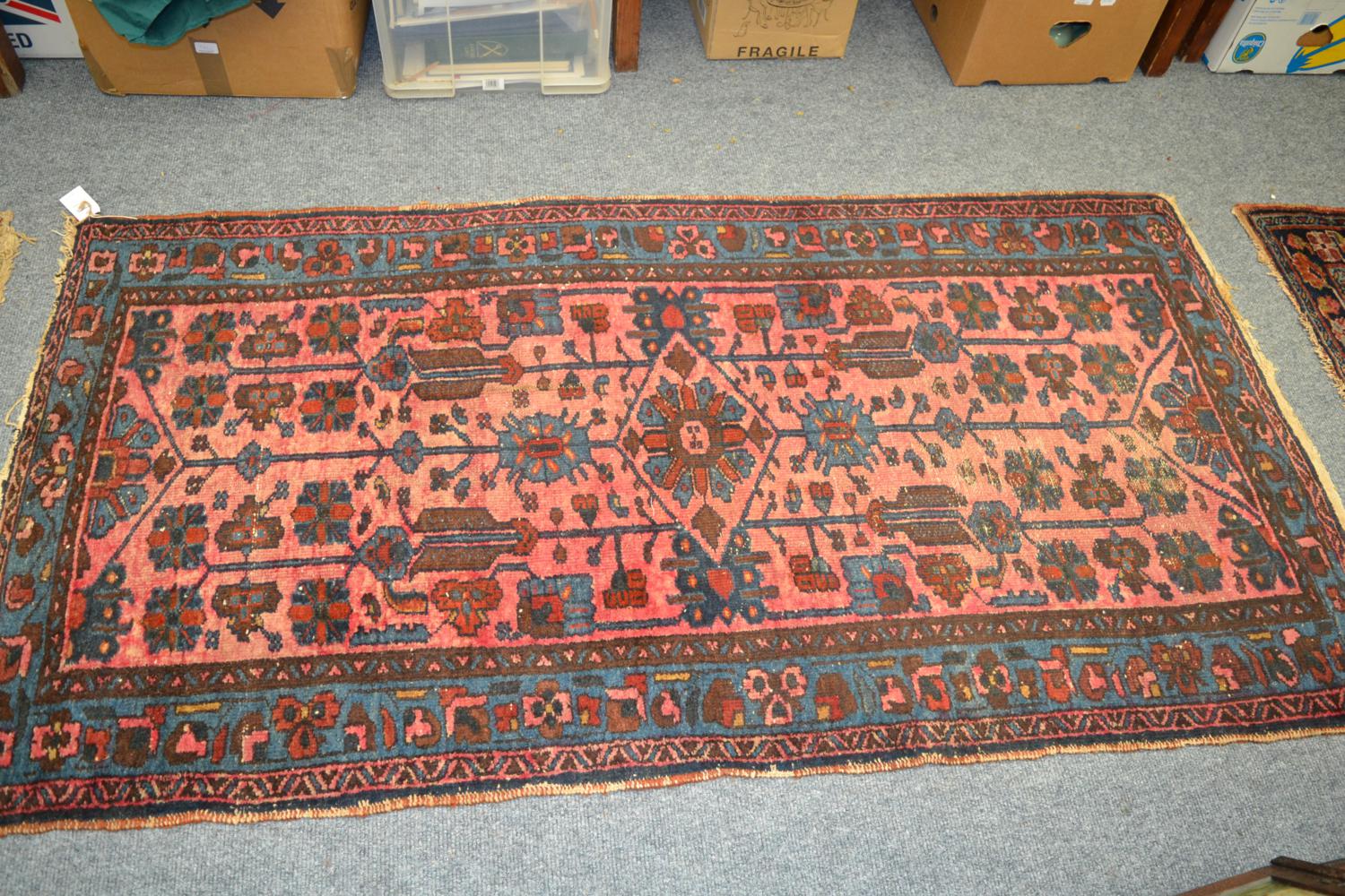 Malayir rug, West Persia, the deep indigo Herati field framed by coral pink spandrels and ivory - Image 3 of 6