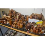 Large quantity of stoneware bottles and ink pots