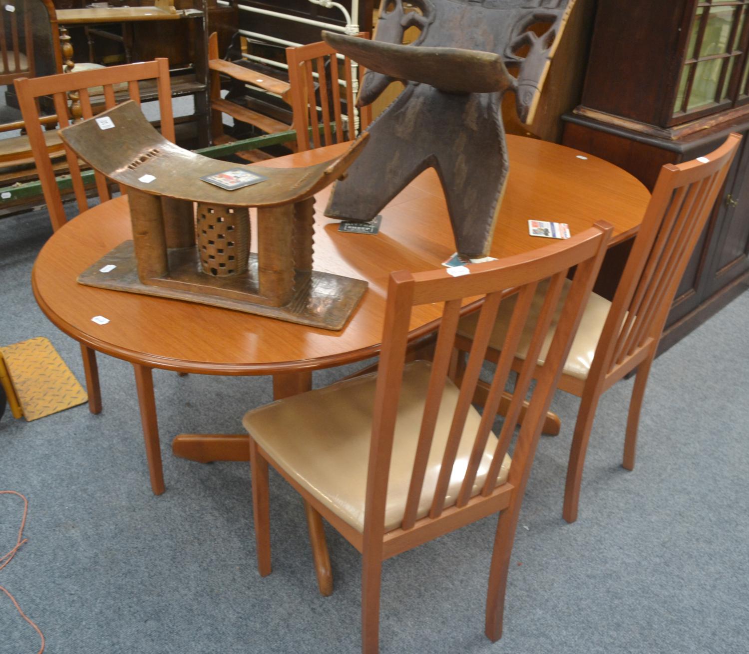 Set of four dining chairs by The Morris Furniture Company and matching extending table