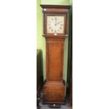 An oak longcase clock with painted dial