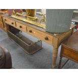 A large Victorian pitch pine three drawer serving table