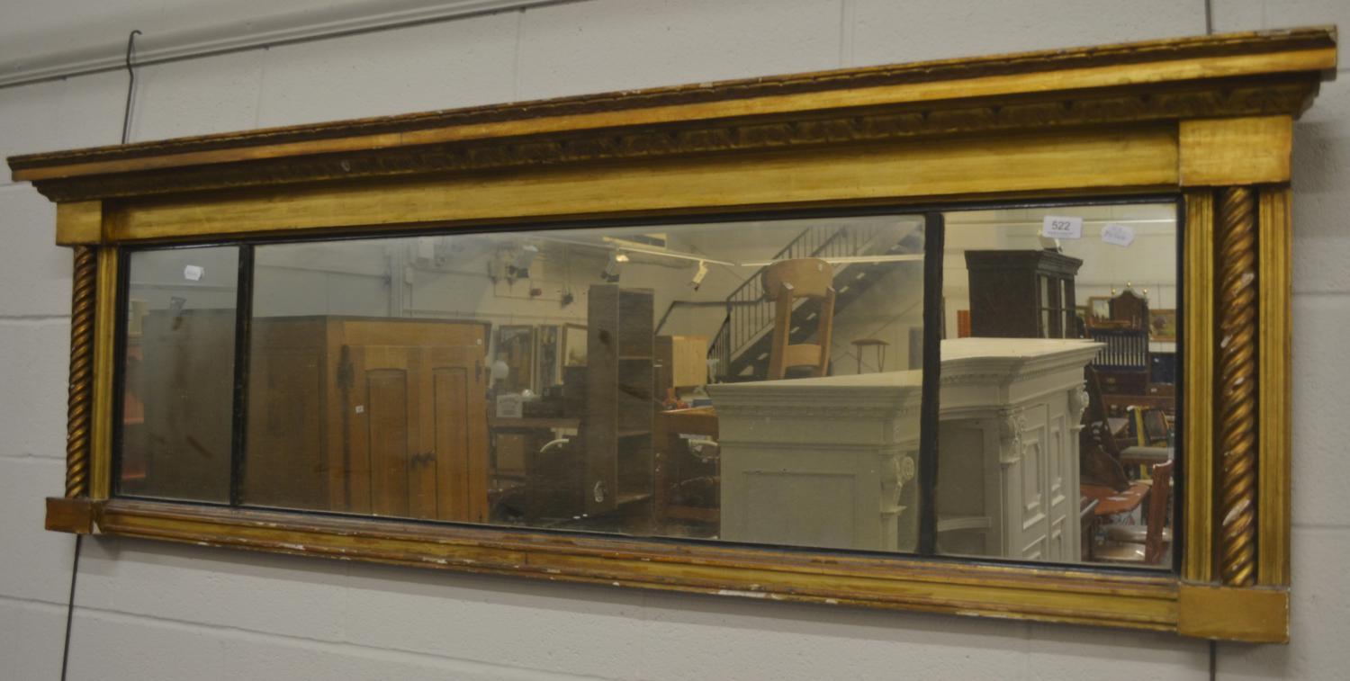 A 19th century gilt and ebonised wall mirror