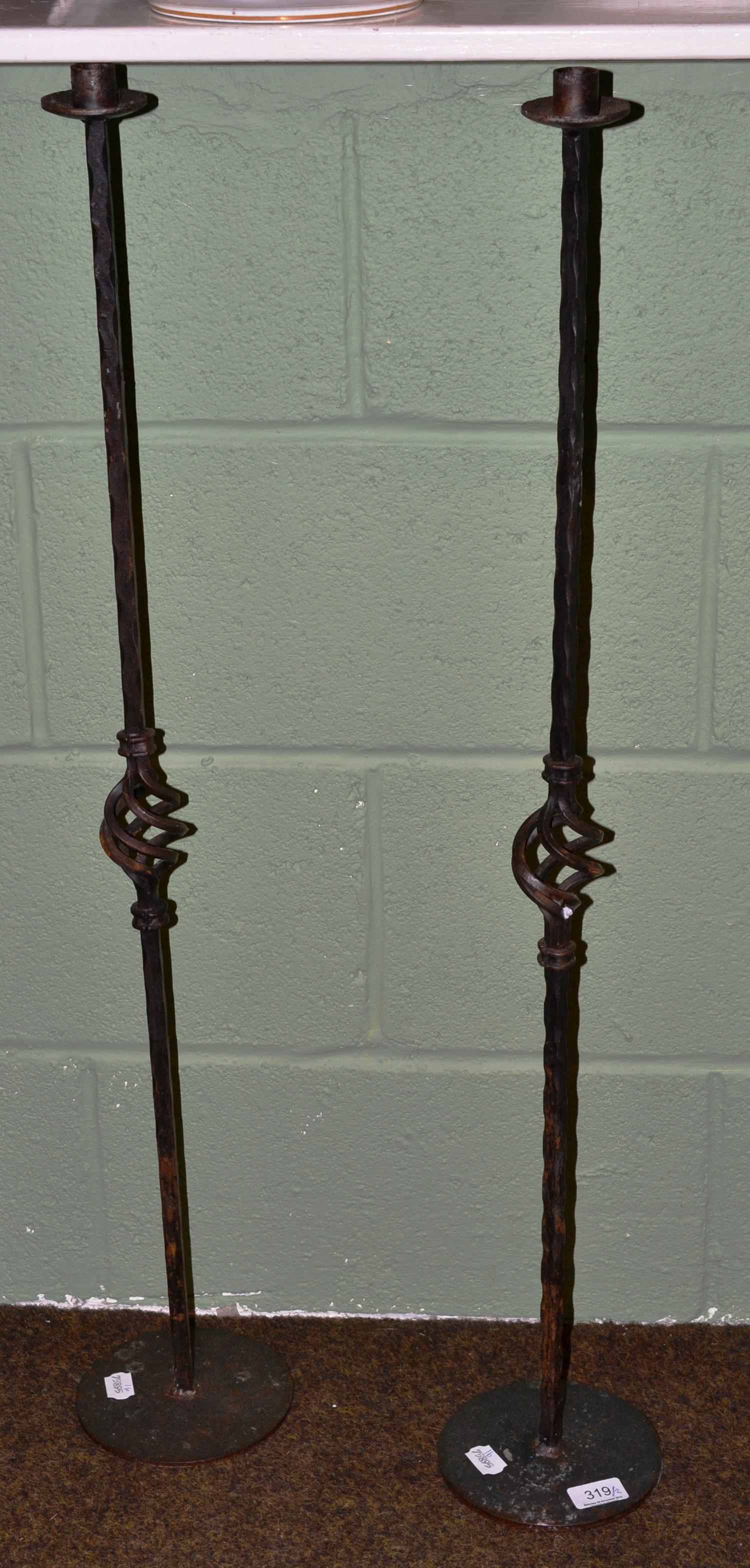 Pair of Arts & Crafts style candle stands