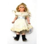Late 19th century wax over Schilling type doll, with fixed brown eyes, blond wig on fabric and
