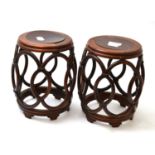 Pair of Chinese hardwood small barrel shaped stands