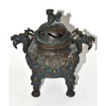 A bronze incense burner