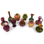 134 Christopher Dresser for Linthorpe Pottery: A Miniature Linthorpe Pottery Vase, red glaze,