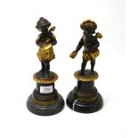 A pair of cherub bronzes