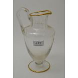 A Baccarat etched and gilt crystal water jug