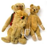 Circa 1905 yellow mohair small Steiff teddy bear with jointed body, humped back, brown stitched