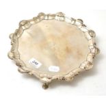 An early George III silver salver 19.8oz. Hallmarks clear. 29cm diameter. Couple of dents, it
