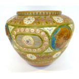 2018 A Linthorpe Pottery Jardiniere, shape No.2018, with moulded flower decoration, mustard, blue,