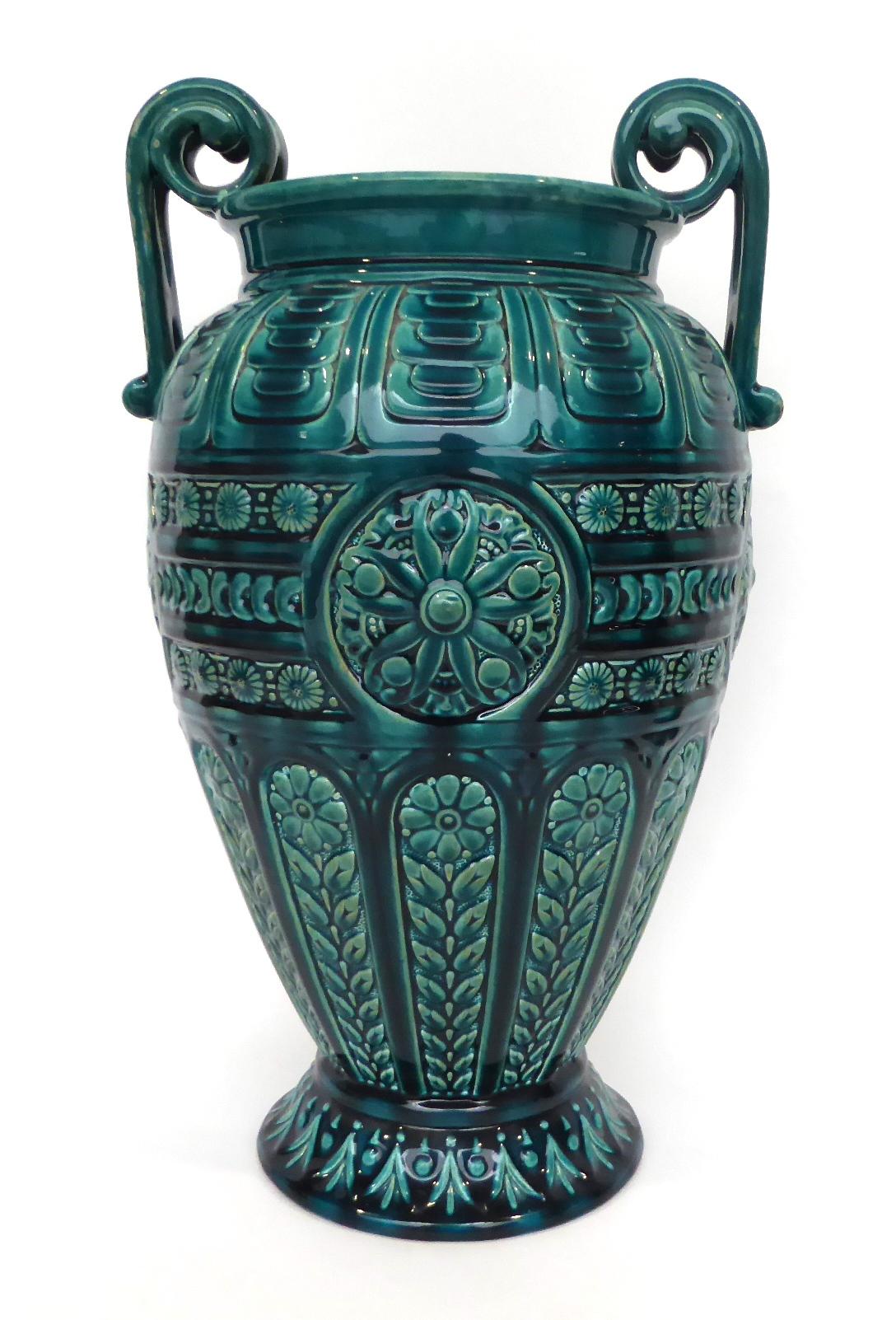 2059 A Linthorpe Pottery Twin-Handled Vase, moulded with a floral repeating pattern, covered in a