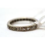 A diamond eternity ring (worn)