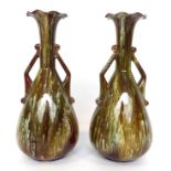 1839 A Pair of Linthorpe Pottery Twin-Handled Vases, green and white running glaze on a brown