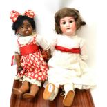 Simon & Halbig/Kammer & Reinhardt mulatto bisque socket head doll, with sleeping brown eyes, open