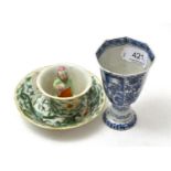 A Kangxi blue and white stem cup together with a Chinese tea bowl and saucer, the interior of the